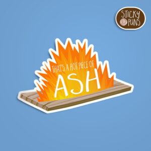 A pun sticker with the phrase 'That's a hot piece of ASH' written on a piece of burning ash wood. Sticker is on a blue background with a sticky puns logo in the top right corner.