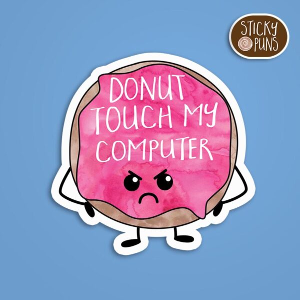 A pun sticker with the phrase 'DONUT Touch My Computer' written on a delicious donut. Sticker is on a blue background with a sticky puns logo in the top right corner.