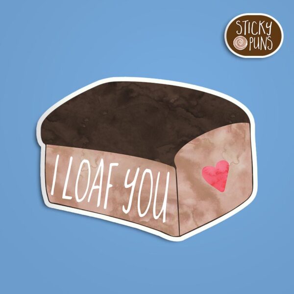 A pun sticker with the phrase 'I loaf you' written on a loaf of bread.  Sticker is on a blue background with a sticky puns logo in the top right corner.