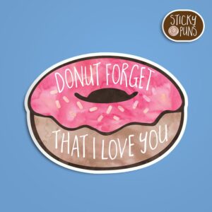 A pun sticker with the phrase 'DONUT Forget That I Love You' written on a donut.  Sticker is on a blue background with a sticky puns logo in the top right corner.