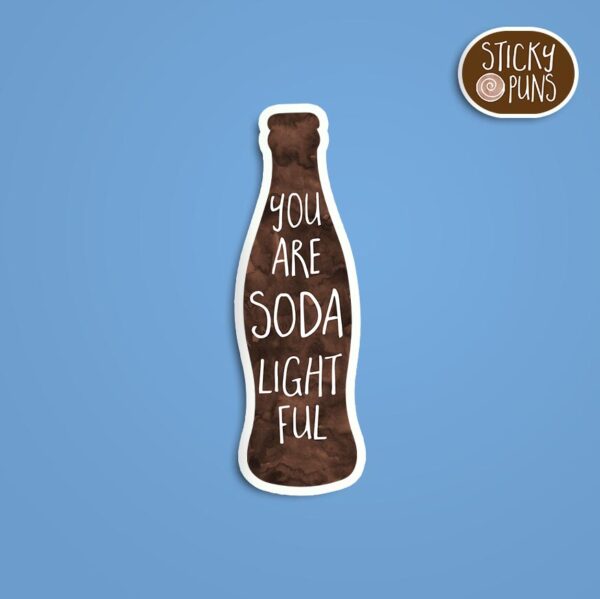 A pun sticker with the phrase 'You are SODA lightful' written on a soda bottle.  Sticker is on a blue background with a sticky puns logo in the top right corner.