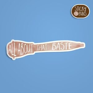 A pun sticker with the phrase 'All about that BASTE' written on a turkey baster.