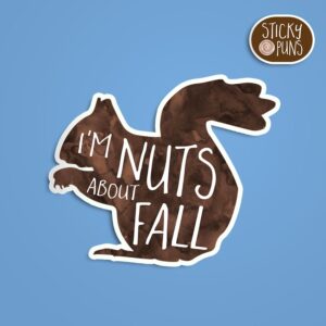 A pun sticker with the phrase 'I'm NUTS About Fall' featuring an enthusiastic squirrel. Sticker is on a blue background with a sticky puns logo in the top right corner.