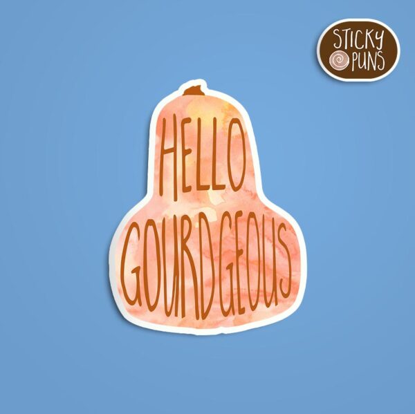 A pun sticker with the phrase 'Hello GOURDgeous' written on an orange gourd.  Sticker is on a blue background with a sticky puns logo in the top right corner.