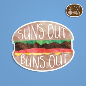 A pun sticker with the phrase 'Suns out buns out' written on a hamburger. Sticker is on a blue background with a sticky puns logo in the top right corner.