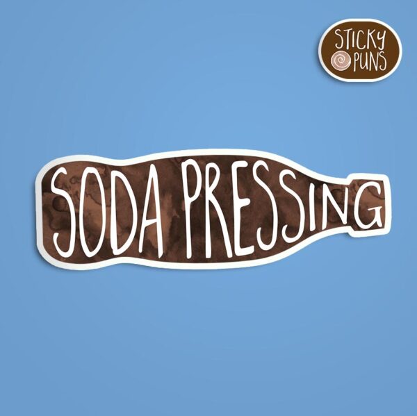 A pun sticker with the phrase 'Soda Pressing. Sticker is on a blue background with a sticky puns logo in the top right corner.