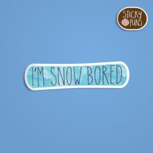 A snowboard pun sticker with the phrase 'I'm SNOW bored. Sticker is on a blue background with a sticky puns logo in the top right corner.