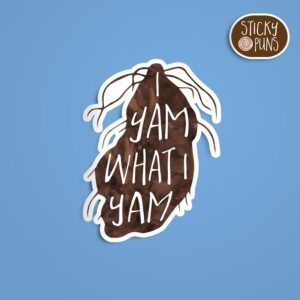 A pun sticker with the phrase 'I yam what I yam' written on a yam. Sticker is on a blue background with a sticky puns logo in the top right corner.