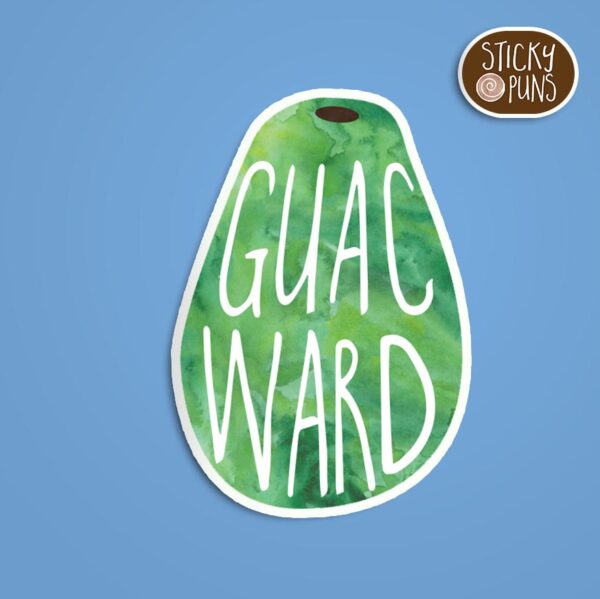 A pun sticker with the word 'Guacward' written on an avocado. Sticker is on a blue background with a sticky puns logo in the top right corner.