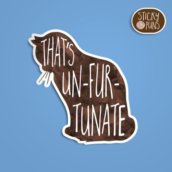 A pun sticker with the phrase 'That's unFURtunate' featuring a cute cat. Sticker is on a blue background with a sticky puns logo in the top right corner.