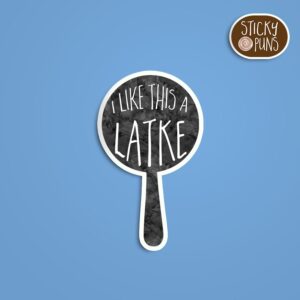 A Hanukkah pun sticker with a frying pan and the phrase 'I like this a latke' written on it. Sticker is on a blue background with a sticky puns logo in the top right corner.