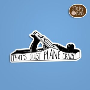 A woodworking themed sticker featuring the phrase 'That's just plane crazy' on a wood plane background. Sticker is on a blue background with a sticky puns logo in the top right corner.