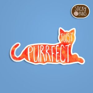 A pun sticker with the phrase 'just PURRfect' featuring a cute cat. Sticker is on a blue background with a sticky puns logo in the top right corner.