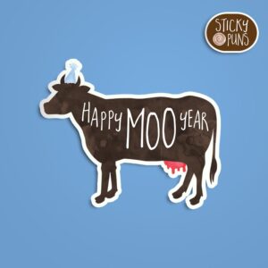 A pun sticker with the phrase 'Happy MOO Year' featuring a cheerful cow. Sticker is on a blue background with a sticky puns logo in the top right corner.