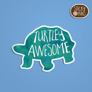 A pun sticker with the phrase 'Turtley awesome' featuring a tortoise.  Sticker is on a blue background with a sticky puns logo in the top right corner.