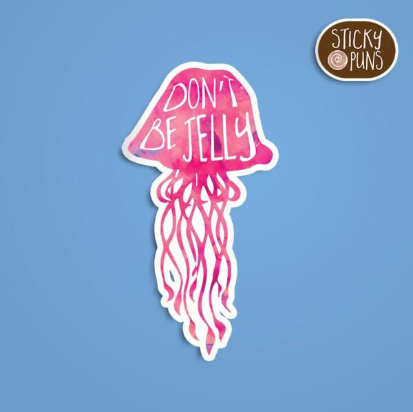 Don't Be Jelly sticker, watercolor jellyfish art, pink and purple jellyfish with flowing tentacles and playful pun