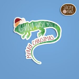 A pun sticker with the phrase 'iguana wish you a merry Christmas' featuring an iguana. Sticker is on a blue background with a sticky puns logo in the top right corner.