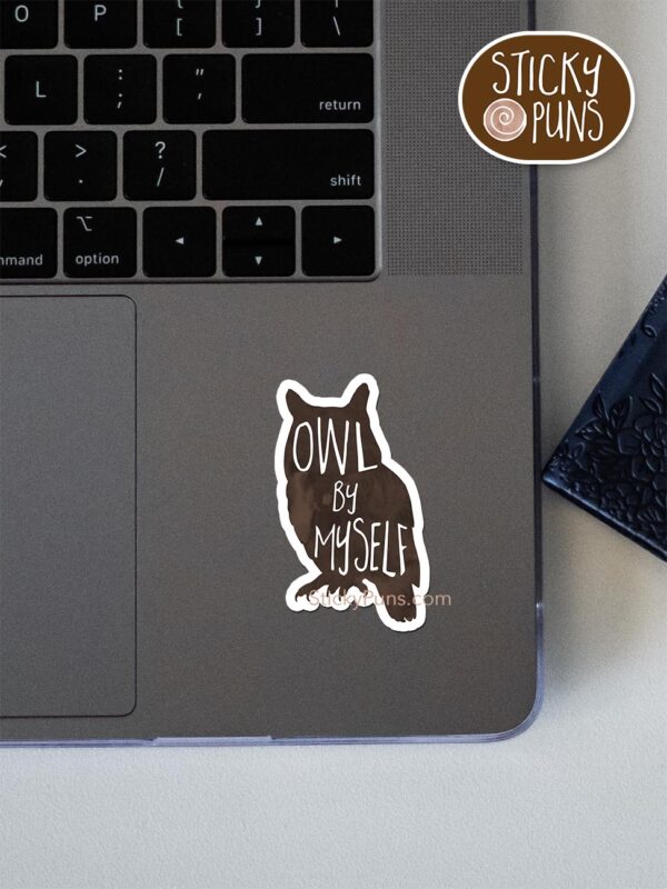 Owl by myself pun sticker shown stuck on a laptop