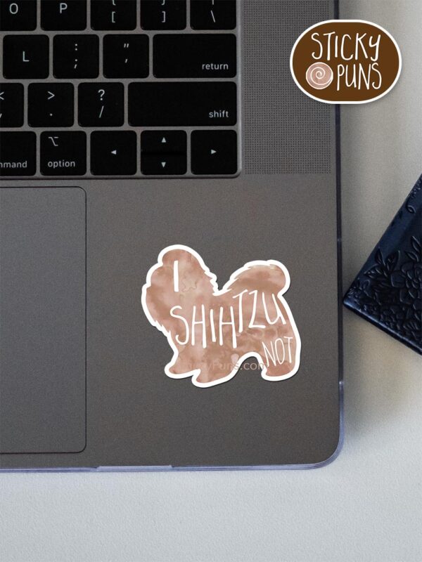 I SHIHTZU not pun sticker shown stuck on a laptop