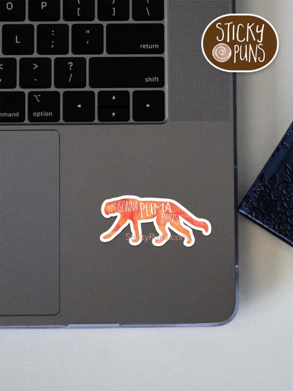 I'm Gonna PUMA Pants! pun sticker shown stuck on a laptop