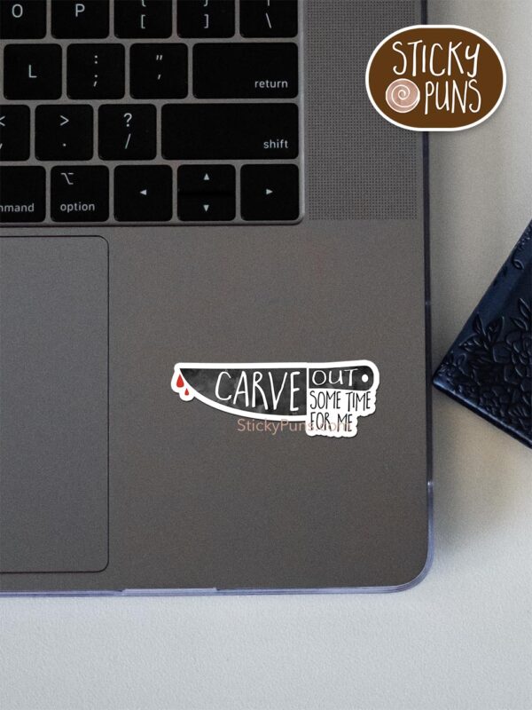 Carve out some time for me pun sticker shown stuck on a laptop