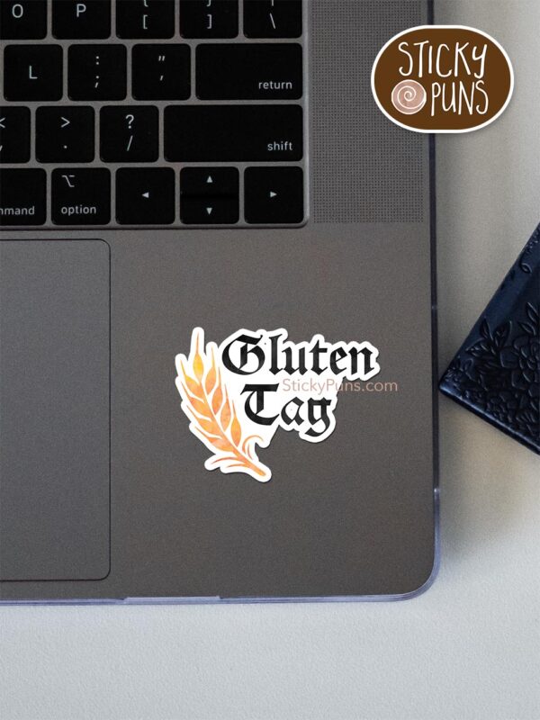 gluten tag pun sticker shown stuck on a laptop