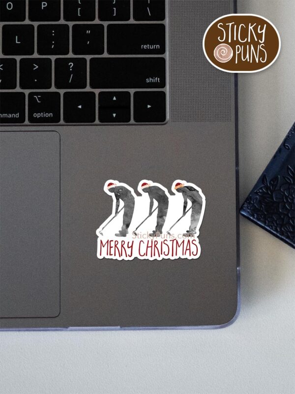 Hoe hoe hoe, Merry Christmas - funny Christmas pun sticker shown stuck on a laptop