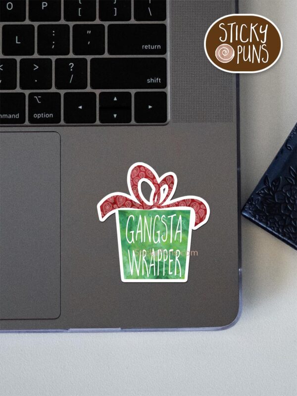 gangsta wrapper pun sticker shown stuck on a laptop