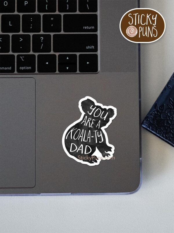 You are a KOALATY dad pun sticker shown stuck on a laptop