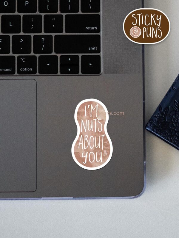 I'm NUTS about you pun sticker shown stuck on a laptop