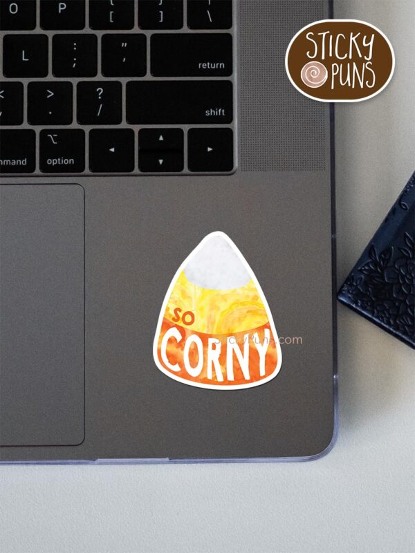 So Corny - candy corn pun sticker shown stuck on a laptop