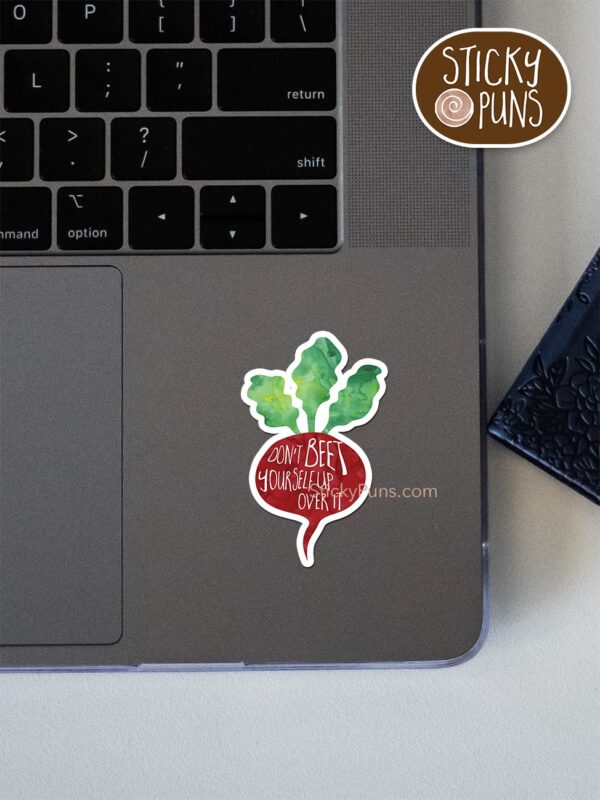 Don't BEET yourself up over it pun sticker shown stuck on a laptop