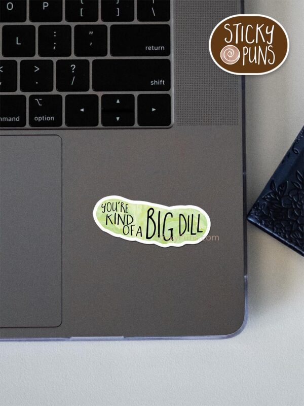 You're kind of a big DILL pun sticker shown stuck on a laptop