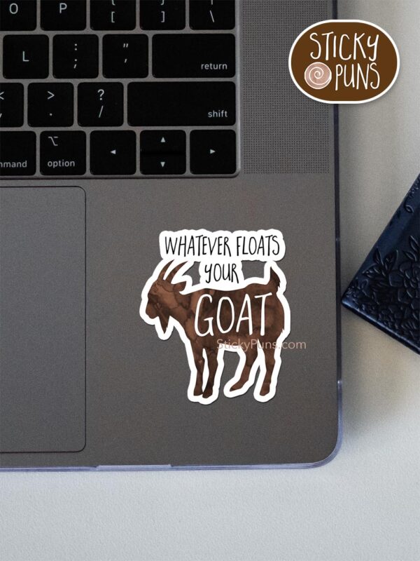 whatever floats your goat pun sticker shown stuck on a laptop