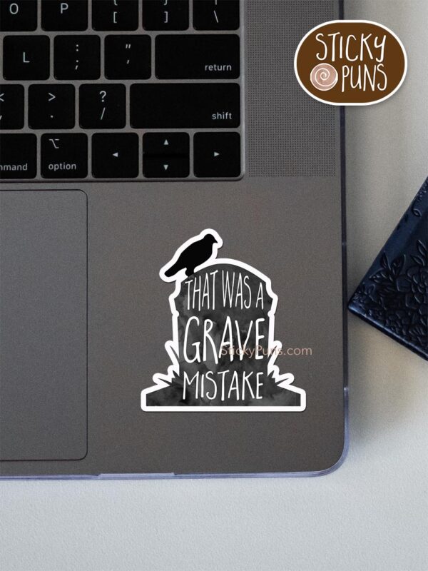 That Was a GRAVE Mistake pun sticker shown stuck on a laptop