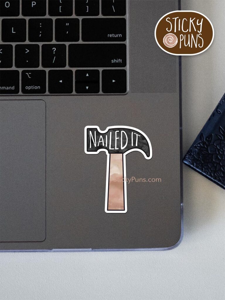 Nailed It! pun sticker shown stuck on a laptop