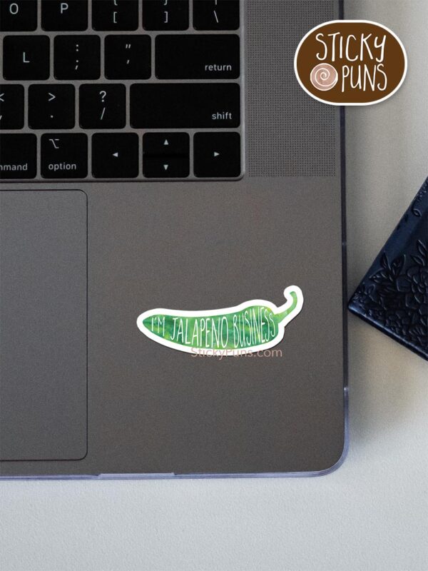 I'm jalapeno business pun sticker shown stuck on a laptop