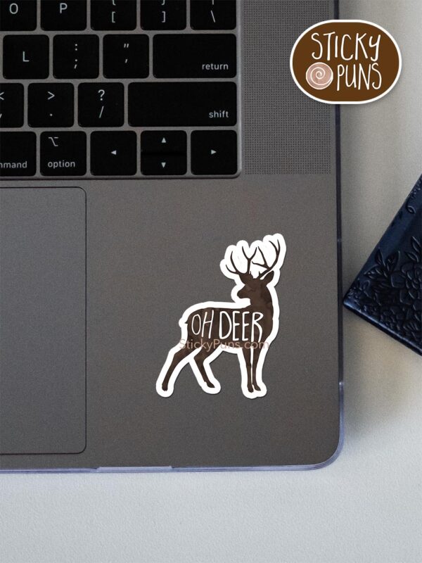 oh deer pun sticker shown stuck on a laptop