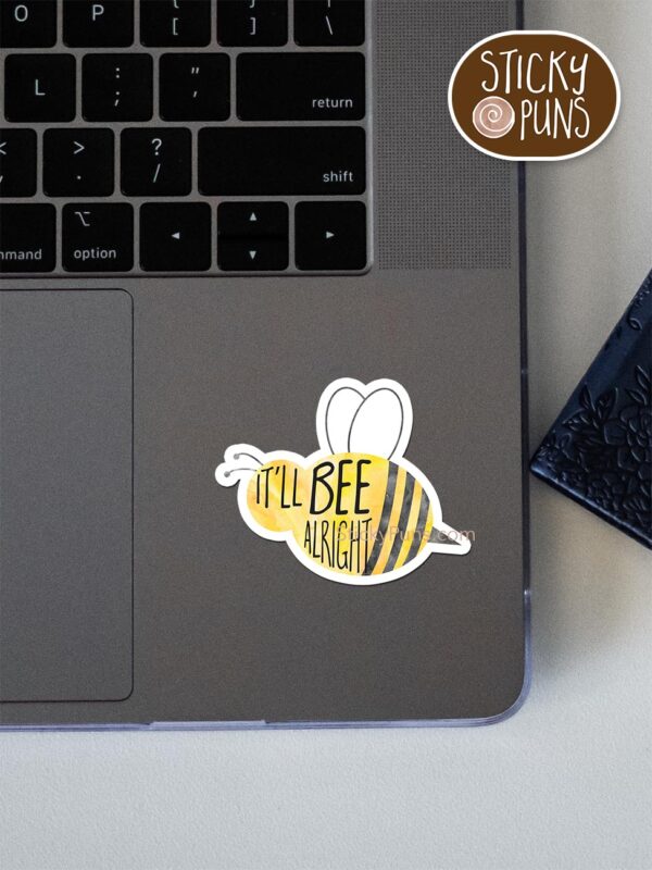 It'll bee alright pun sticker shown stuck on a laptop