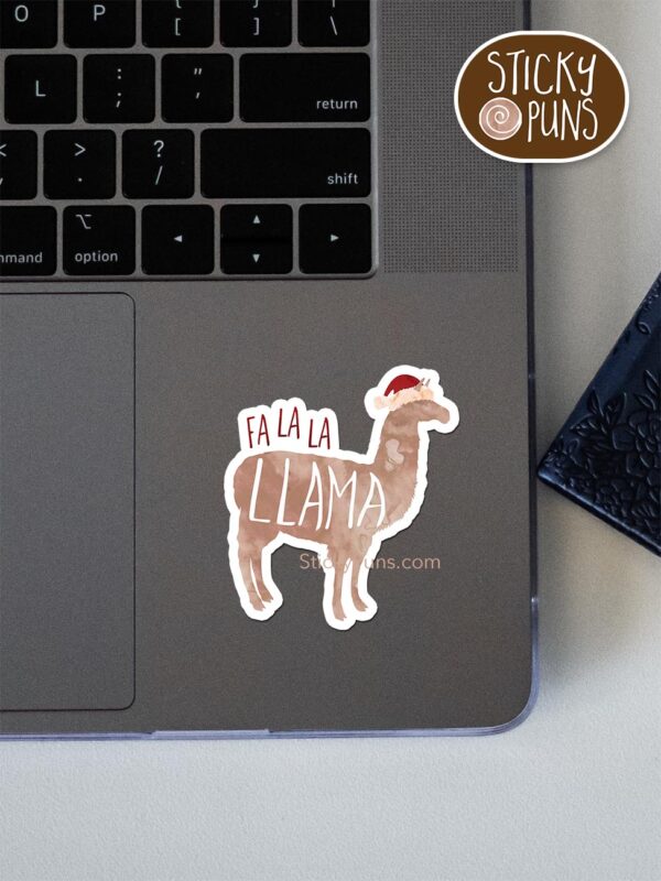 fa la la llama pun sticker shown stuck on a laptop