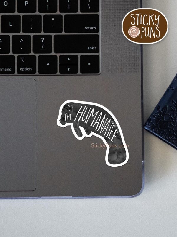 oh the humanatee pun sticker shown stuck on a laptop