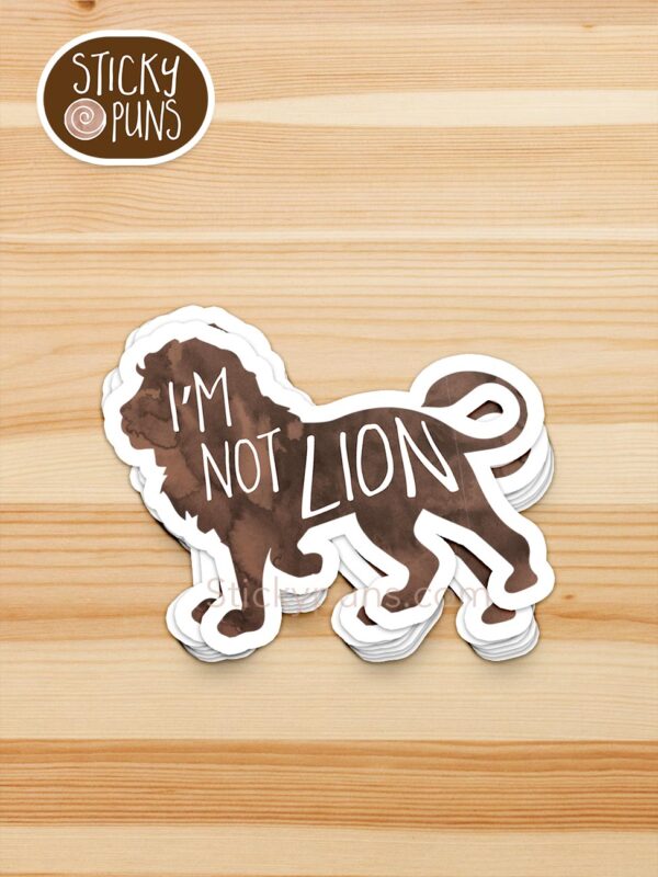 stack of I'm not LION pun stickers