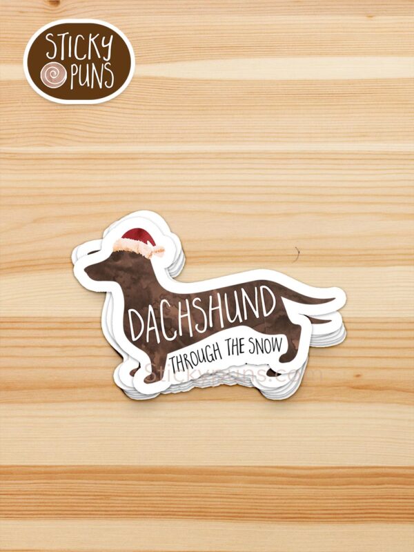 stack of dachshund through the snow pun stickers